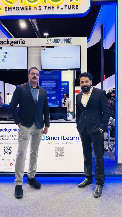 SmartLearn LMS booth with Train Smart Work Safe branding at a technology exhibition