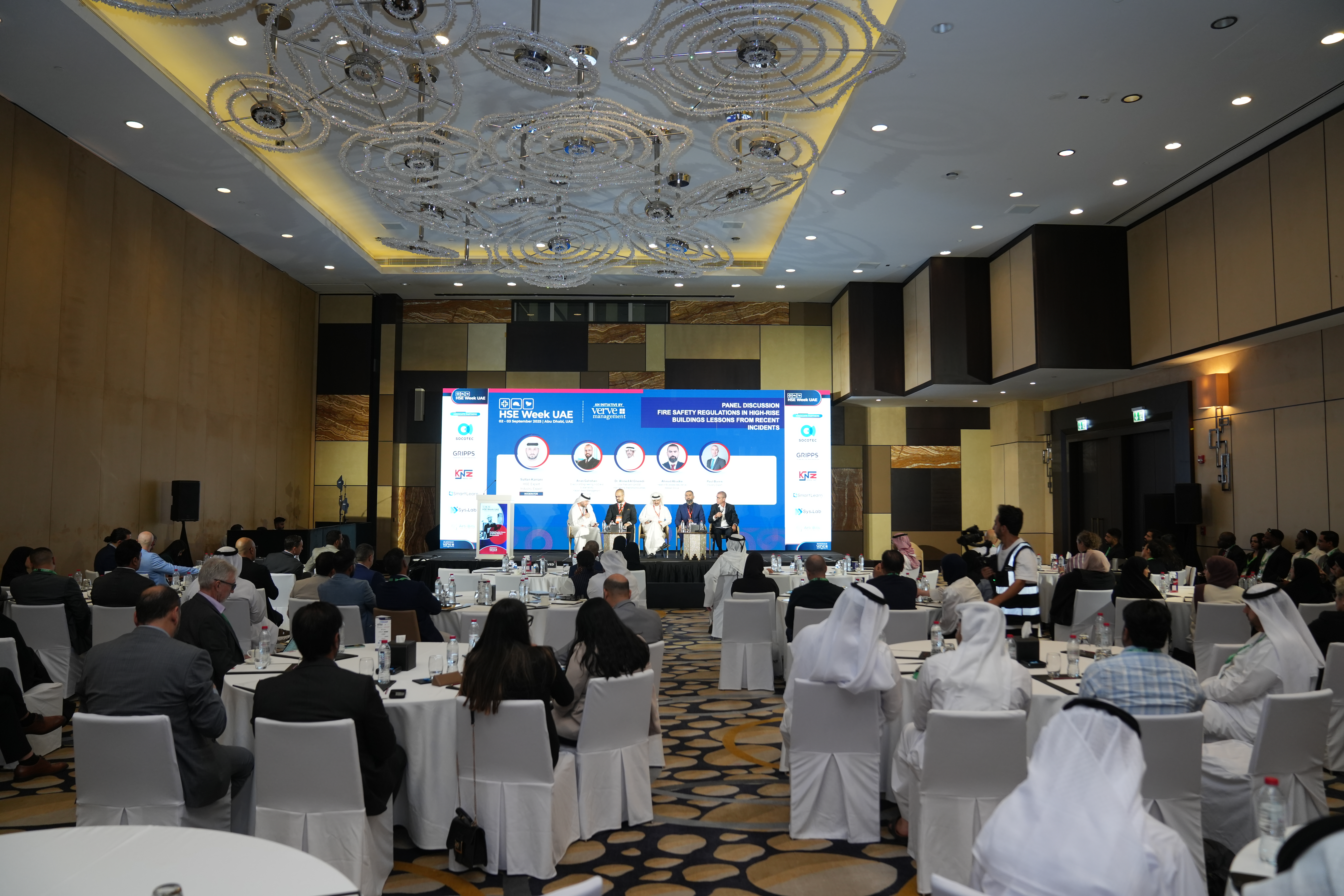 Panel discussion on stage at an HSE Network UAE conference